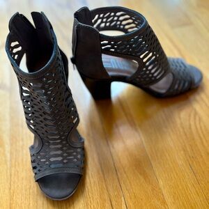 Bu Nu Lu dark tan cutout heeled sandals.